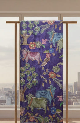 Embroidered fabric with colorful animals and floral patterns on a purple background